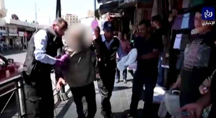 Police deal with drunk man in Downtown Amman