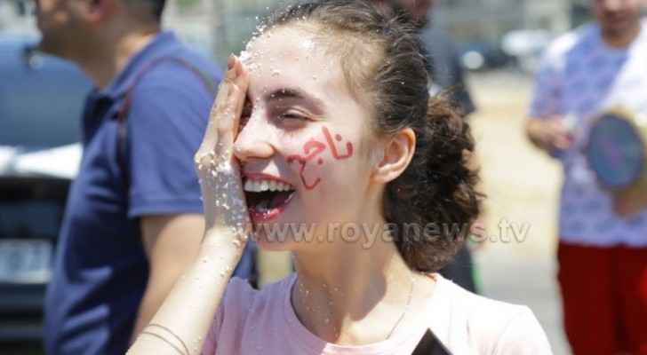 Photos, video: Tawjihi students celebrate their success