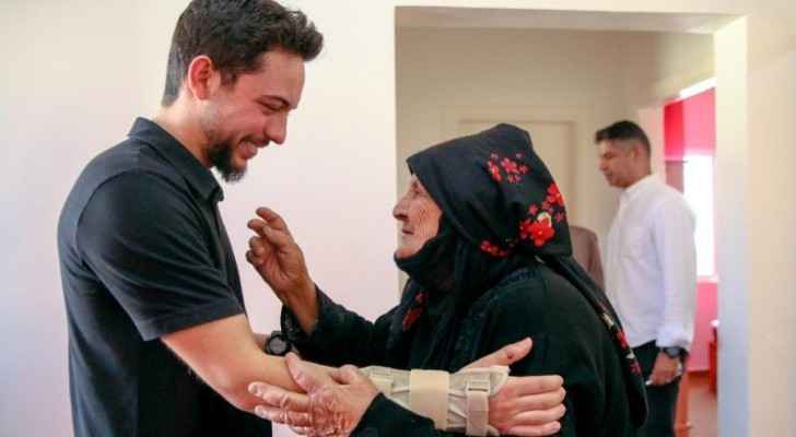 Crown Prince accompanies elderly woman to her new home he instructed to be built