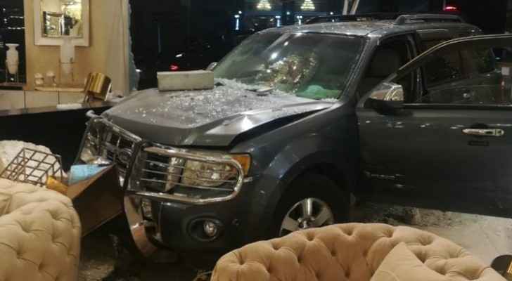 Photos: Car drives into furniture store in Amman