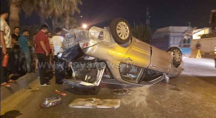 Car flips in major road accident in Amman