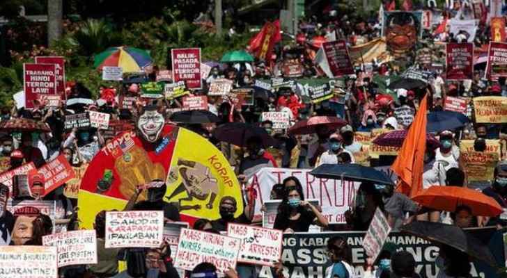 Protester march in Manila. Photo credit: Reuters.