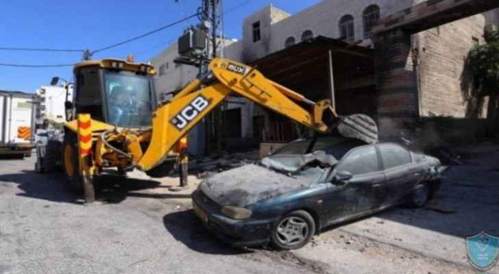 Palestinian father hands over son's illegal vehicle to authorities in Hebron