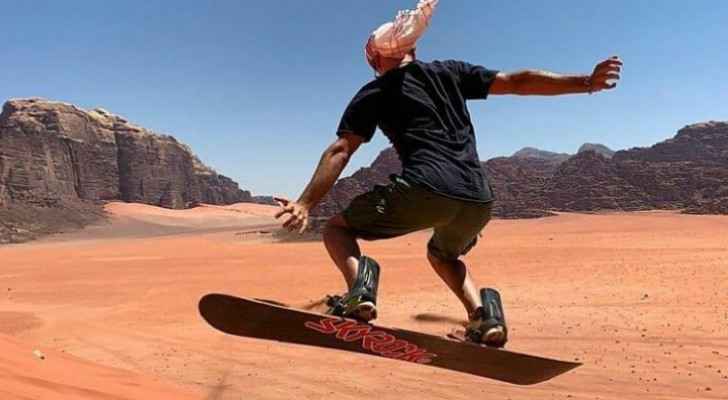 Roya discovers sand surfing in Wadi Rum
