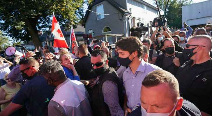 VIDEO: Man charged with assault after throwing stones at Canada's PM