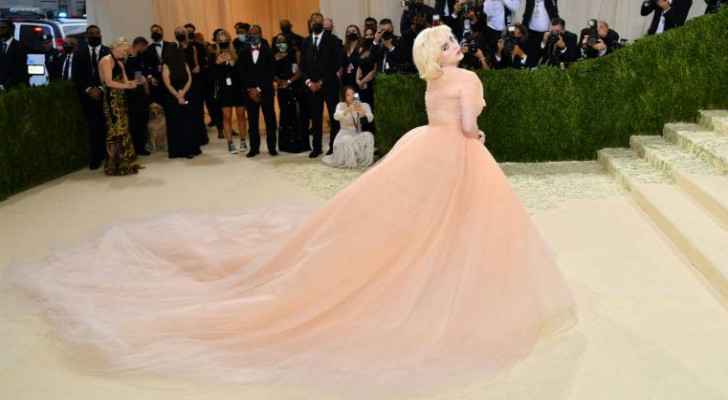 Stars dazzle in defiant fashion at 'surreal' Met Gala