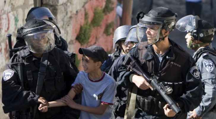 Old image of Israeli Occupation arresting a child