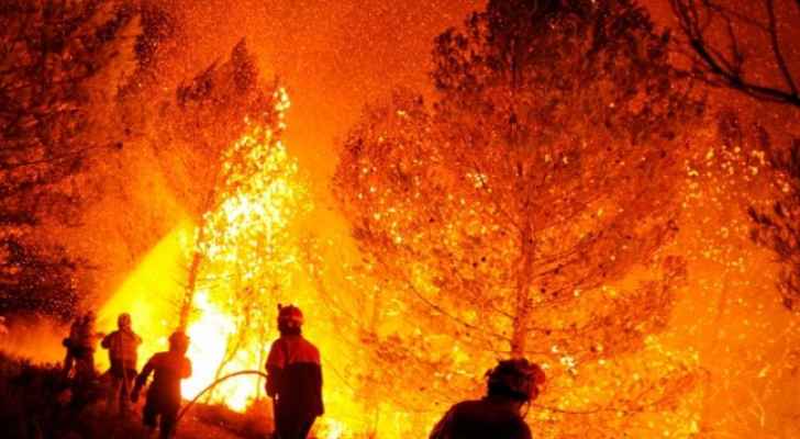 Spain, Portugal battle to control huge wildfires