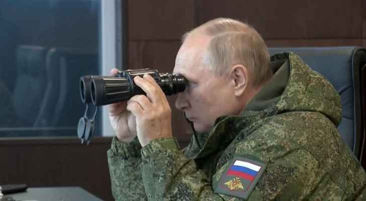 Bolstering Asia ties, Putin watches military drills with China