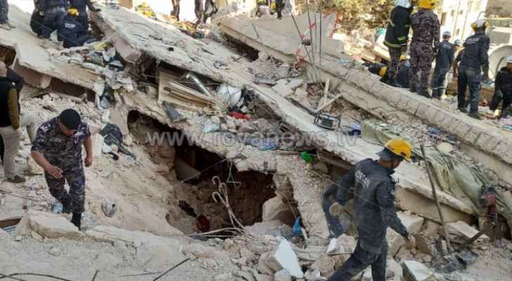 Rescue operations at site of collapsed building in Al-Weibdeh