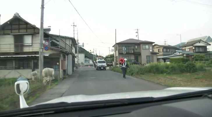 Three killed, including two police, in Japan gun, knife attack