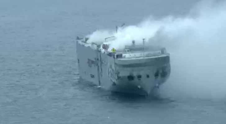 Ship blaze off Dutch coast losing 'intensity'