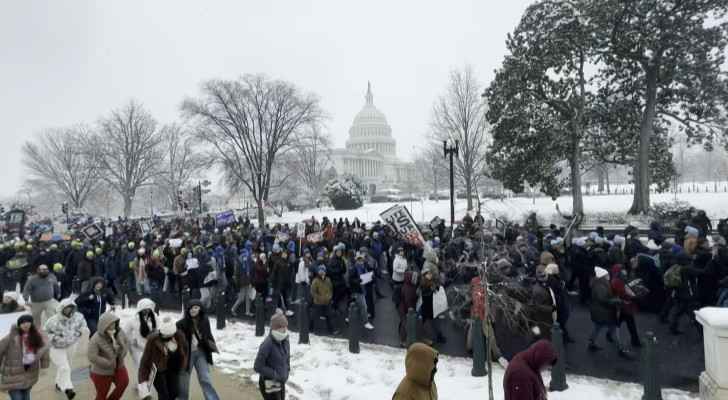 Anti-abortion activists march on snowy Washington