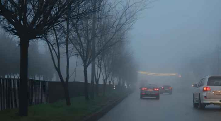 Fog blankets areas in West Amman, causing reduced visibility