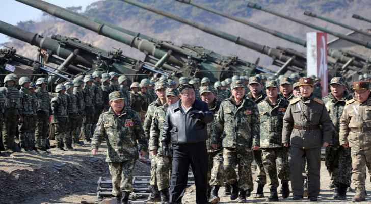 Kim Jong Un overseeing the large-scale artillery exercises