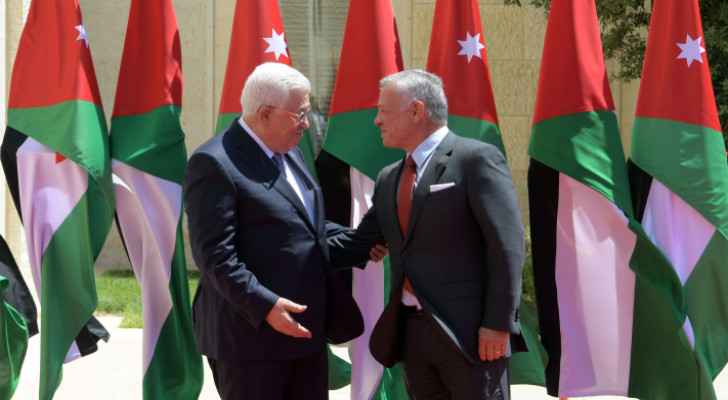 His Majesty King Abdullah II and the Palestinian President Mahmoud Abbas (File photo) 