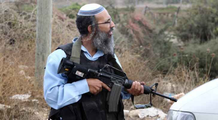 Armed "Israeli" settler. (File photo) 