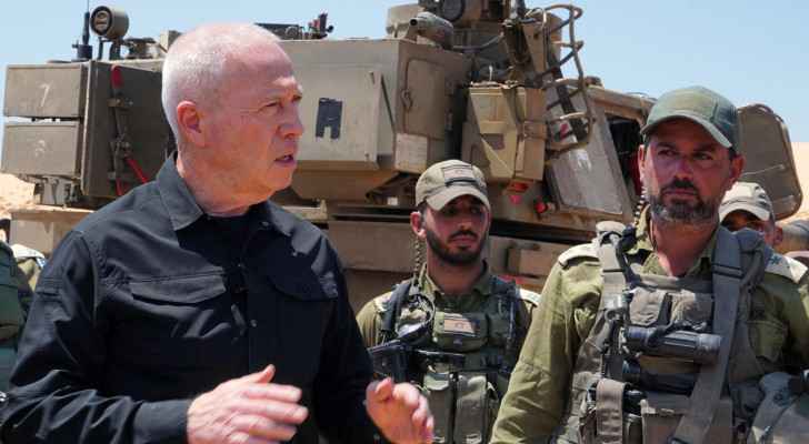 “Israeli” Defence Minister Yoav Gallant with soldiers near Rafah. (File photo: AFP) 
