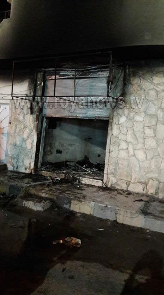 A burnt-out shop in Ramtha following tribal violence